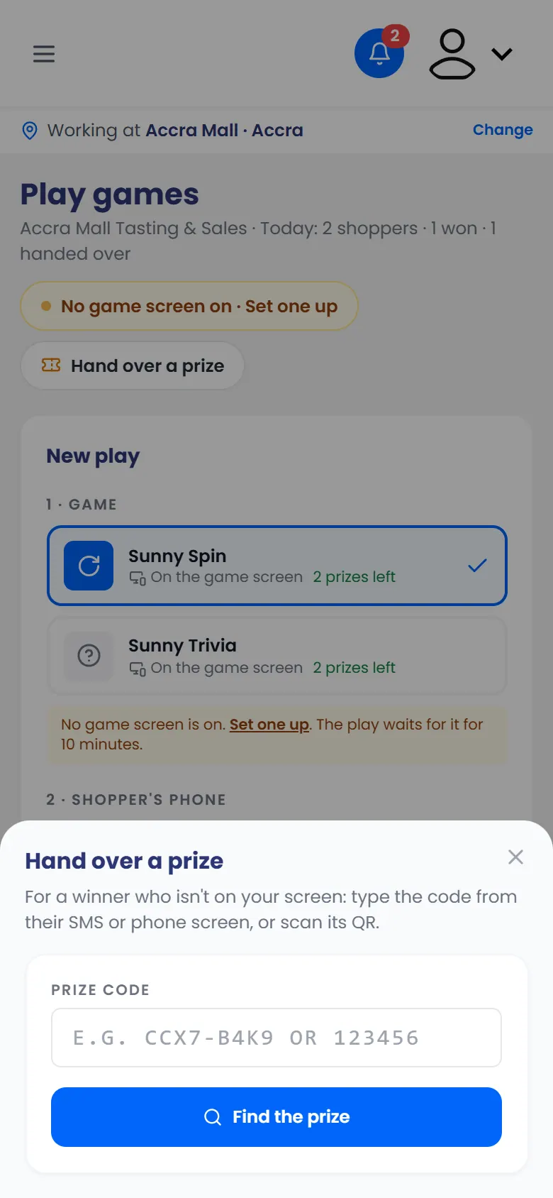 Hand over a prize: type the code, or scan its QR